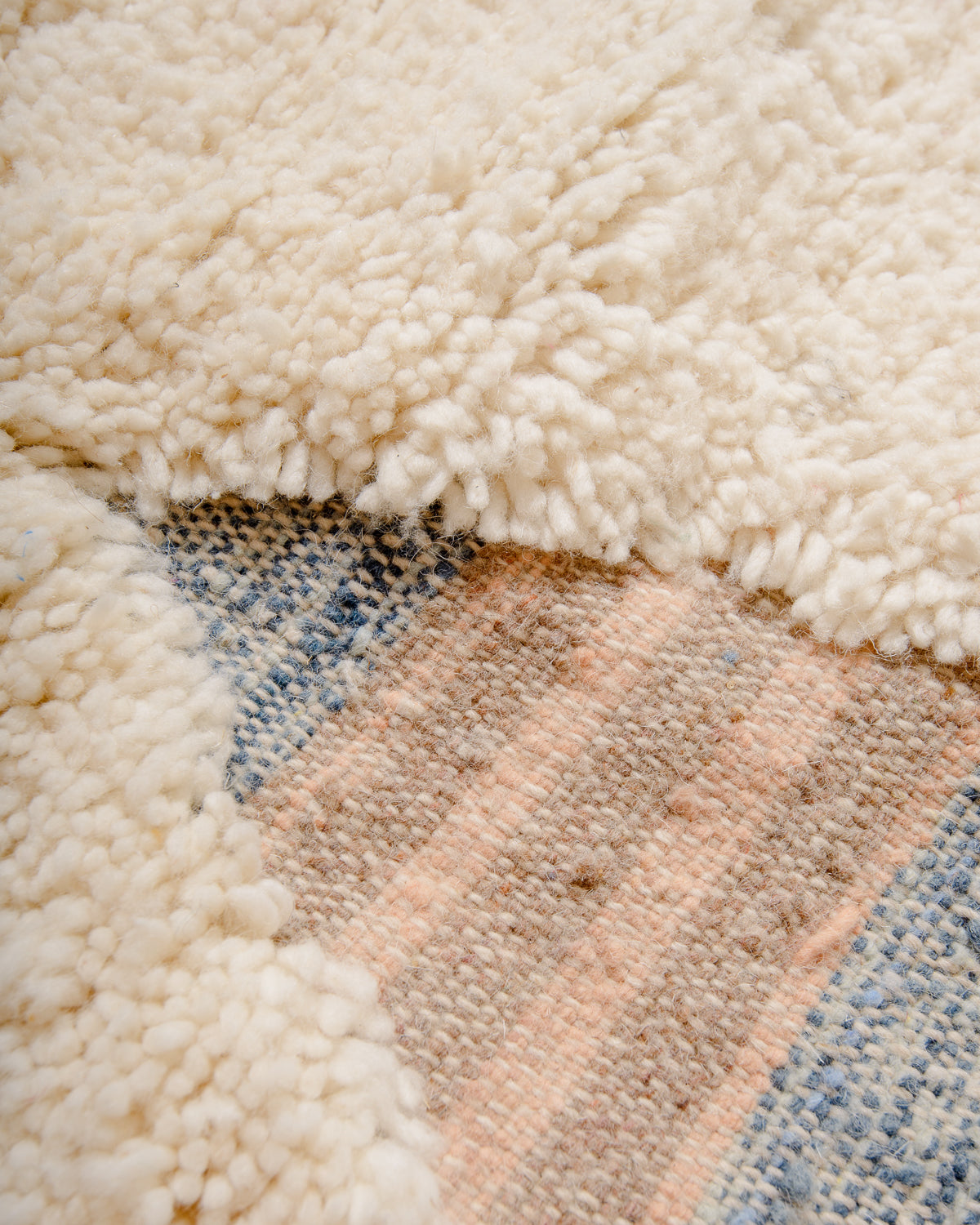 Modern, designer, handcrafted Berber rug from Morocco. Beniourain carpet with beautiful colours and patterns and fluffy wool texture.